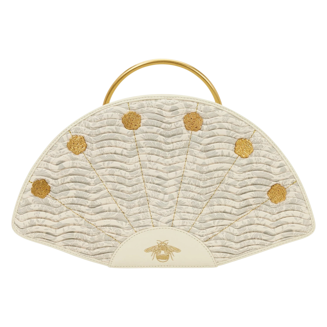 Cards & Comics Connection Bridgerton fan-shaped handbag in cream polyurethane with gold rivets and bee embroidery.