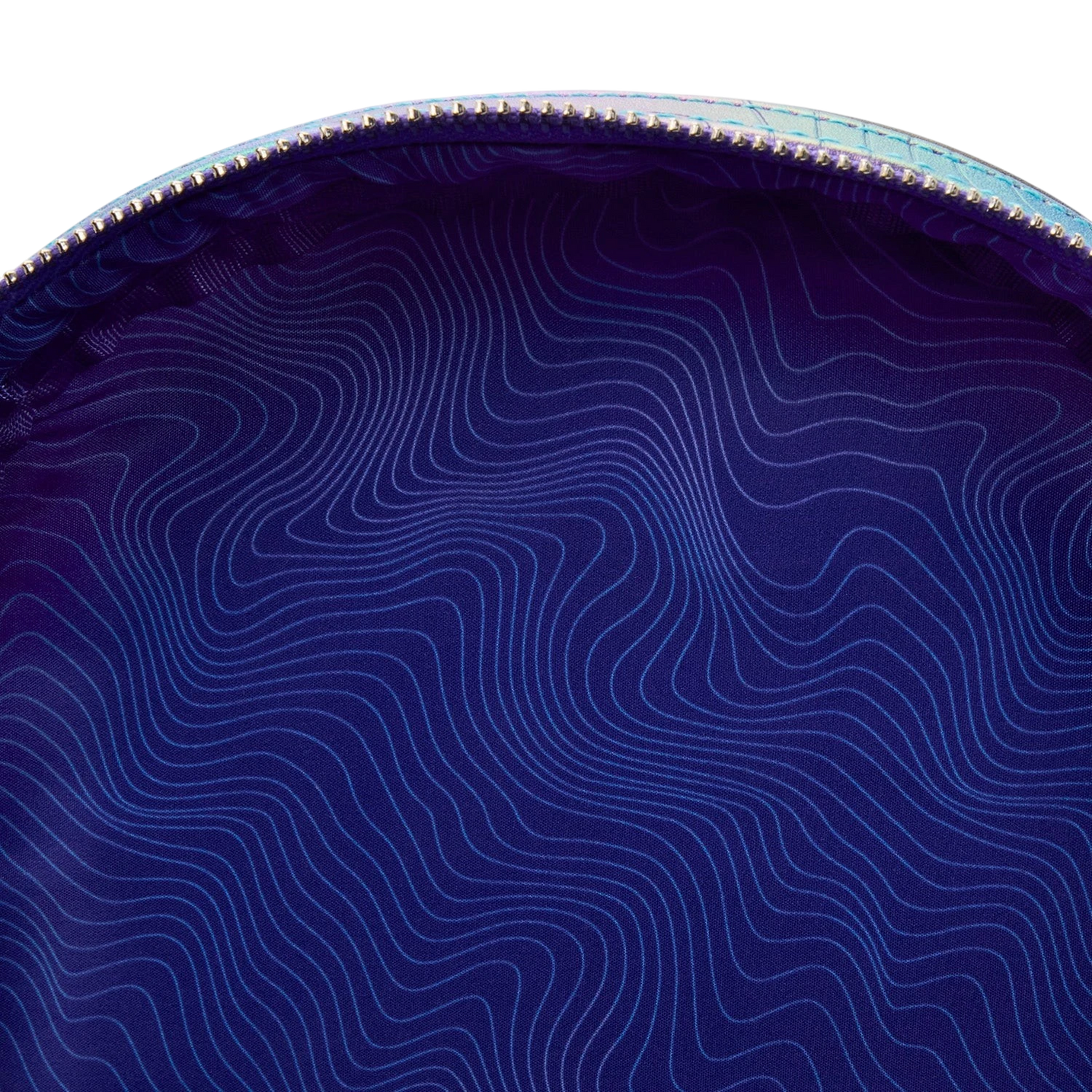 Cards & Comics Connection HUNTR/X mini backpack interior featuring a deep purple lining with wavy line patterns.